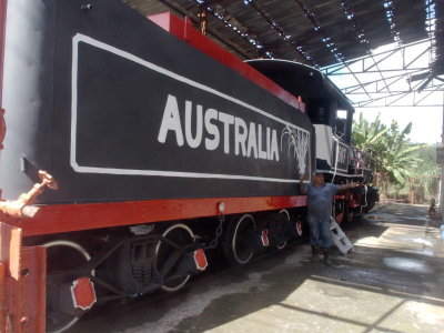 Steam locomotive and minder