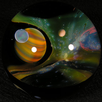 This amazing Universe marble by Gateson features a small cab from Junichi, fashioned into a planet!
