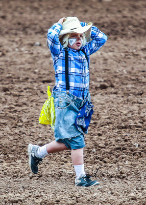 Junior Rodeo Clown works the arena at the Tucson Rodeo
