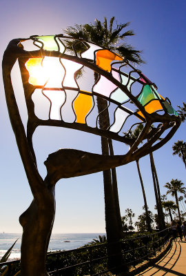 The sun filtering through artwork along the coast in Laguna Beach