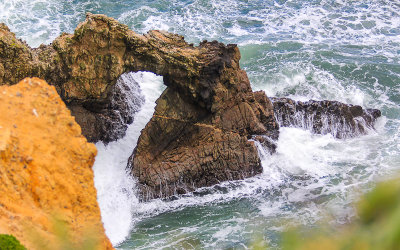 Waves pound a formation at the end of Chimney Rock in Point Reyes National Seashore