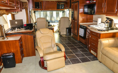 Looking forward at the fully expanded living compartment in the 2008 Fleetwood Discovery