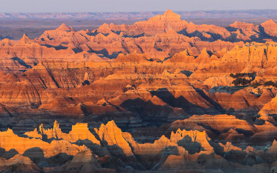 Light from the rising sun on the valley in Badlands National Park