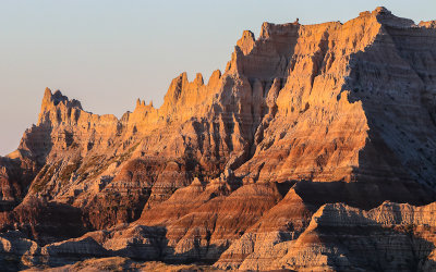 Sunrise throws striking light on peaks in Badlands National Park