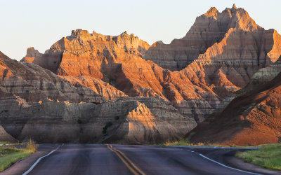 Early morning light in the peaks above the park road in Badlands National Park