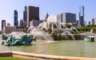 Buckingham Fountain in Grant Park with downtown buildings in the background in Chicago 