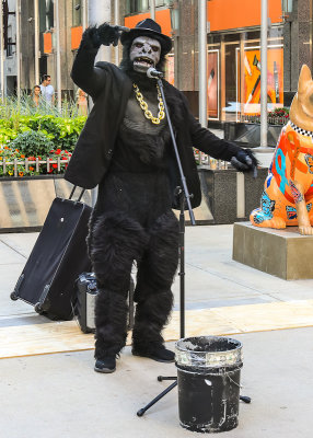 A downtown street performer rapping in Chicago