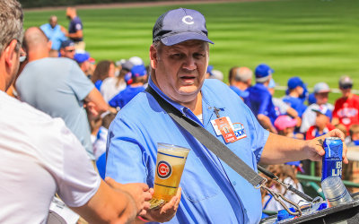 Beer vendor making a sale at Wrigley Field