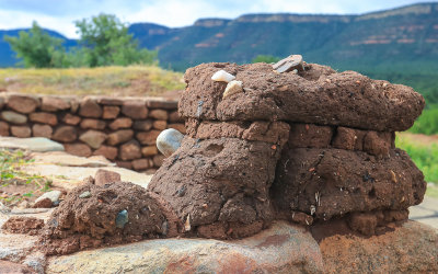 Weathered adobe bricks on the 1625 church foundation in Pecos National Historical Park