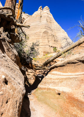 The Slot Canyon Trail at the base of a tent rock formation in Kasha-Katuwe Tent Rocks National Monument