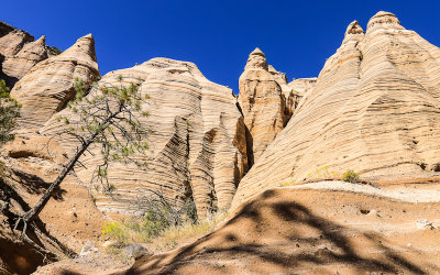 Towering tent rock formations along the Slot Canyon Trail in Kasha-Katuwe Tent Rocks National Monument