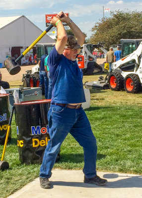 Ted showing off his strength (he did not ring the bell) at Husker Harvester Days near Grand Island Nebraska