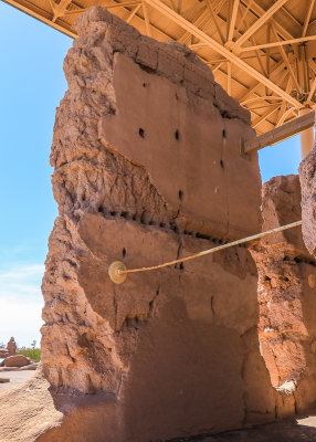 Exterior wall supported by a metal rod in Casa Grande Ruins National Monument