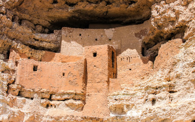 Midday sun lights up the cliff dwelling in Montezuma Castle National Monument