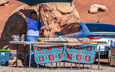 Local resident selling jewelry, pots and rugs along US 89A in Vermilion Cliffs National Monument