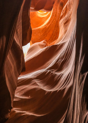 Navajo Sandstone reflects bright sunlight in Antelope Canyon