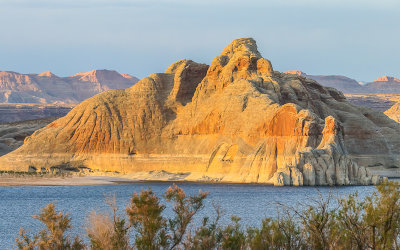 The setting sun reflected on a formation along Wahweap Bay in Glen Canyon NRA