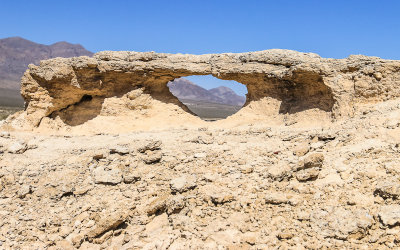 Window highlights the Sheep Mountain Range in Tule Springs Fossil Beds NM