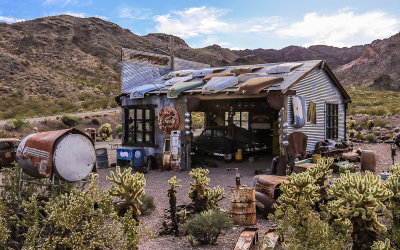 Garage surrounded by Cholla Cactus in El Dorado Canyon, Nelson Nevada