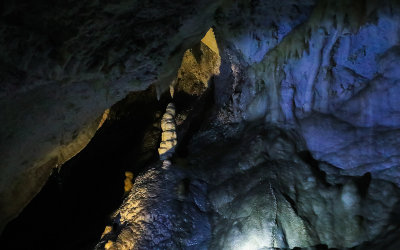 Stalactite and a large stalagmite in Timpanogos Cave National Monument