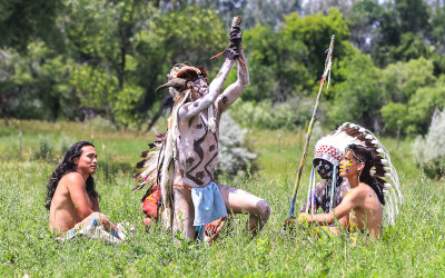 Lakota Warrior White Bull presents an offering during the show at the Real Bird Reenactment Event