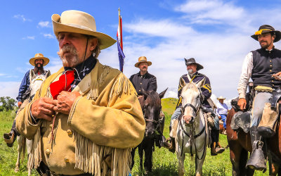 Lt. Col. George Armstrong Custer surrounded by his troops at the Real Bird Reenactment Event
