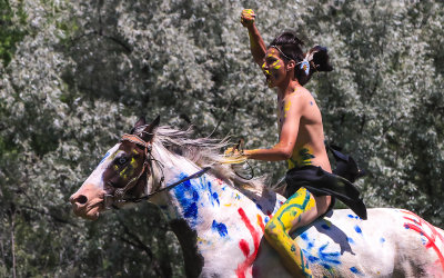 Warrior of the Cheyenne Nation rides at the Battle of the Little Bighorn