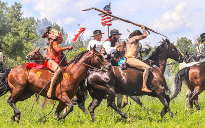 7th Cavalry troops and Indian Nation warriors clash at the Battle of the Little Bighorn