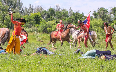 Lakota Warrior Sitting Bull (left) among the dead troops at the Battle of the Little Bighorn