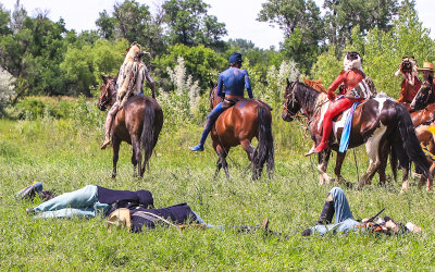 Indian Nation warriors ride off victoriously at the Battle of the Little Bighorn