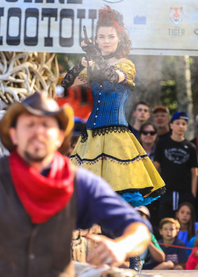 Yes, she shot him in the back, in the Town Square Shootout in Jackson Hole Wyoming