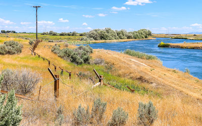 Barbed wire fence along the North Side Main Canal in Minidoka National Historic Site 