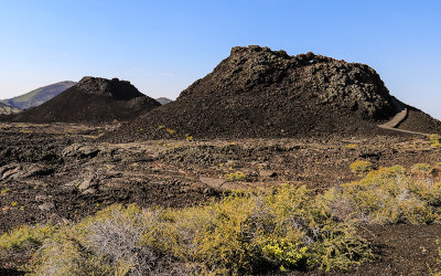 Spatter Cones with Big Cinder Butte in the background in Craters of the Moon National Monument