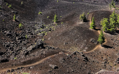 Path snakes through a crater along the North Crater Trail in Craters of the Moon National Monument