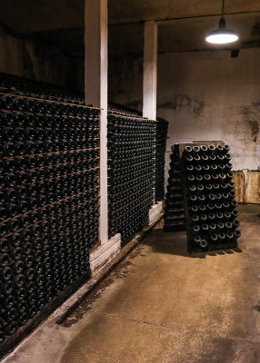 Stacked champagne bottles in the Korbel Champagne Cellars
