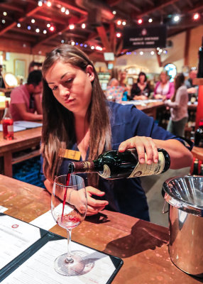 Serving up wine in the wine tasting room at the V. Sattui Winery in Napa Valley