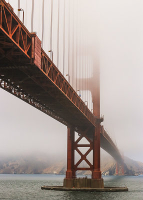 The Golden Gate Bridge in the fog from Fort Point National Historic Site