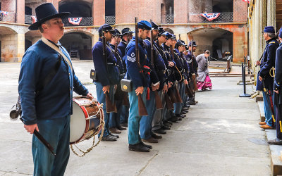 Civil War troops in formation on the parade grounds in Fort Point National Historic Site