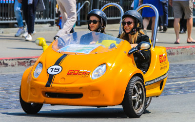 Tourists in a GOcar rental on the street in San Francisco