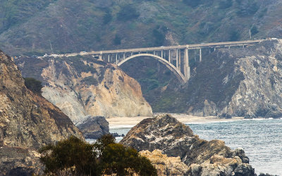Approach to the historic Rocky Creek Bridge, built in 1932, along California Highway 1