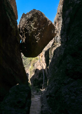 Boulder wedged over the trail along the Bear Gulch Cave Trail in Pinnacles National Park
