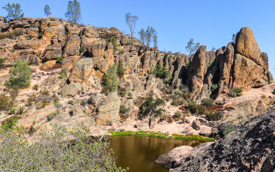 Rock walls surrounding the Bear Gulch Reservoir in Pinnacles National Park
