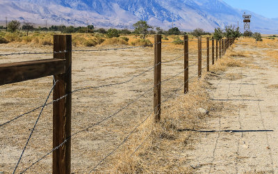 Perimeter barbed wire fence and Guard Tower in Manzanar National Historic Site