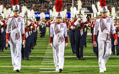 Arizona Drum Majors lead the band onto the field prior to the game