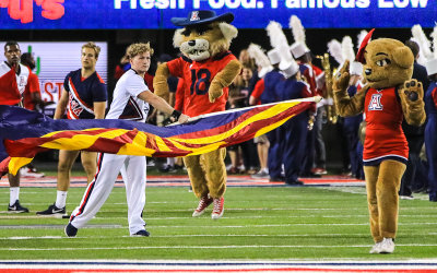 Wildcats Mascots Wilber and Wilma dance before the team enters the stadium