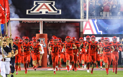 Wildcats charge onto the field before kickoff