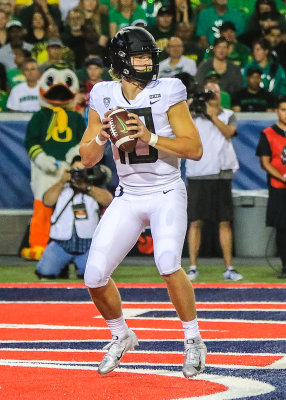 Ducks QB Herbert looks to throw from his own end zone