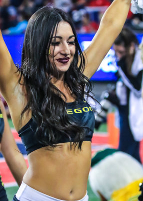 Oregon Cheerleader performs on the sidelines during the game