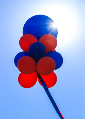 Balloons flying over the Wildcats for Life Tailgate Party