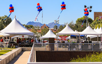 Homecoming tents with Old Main and the Tucson Mountains in the distance